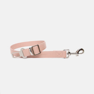 Pink dog car leash made with premium vegan leather. Car restraint to keep your dog in place during car rides or travel